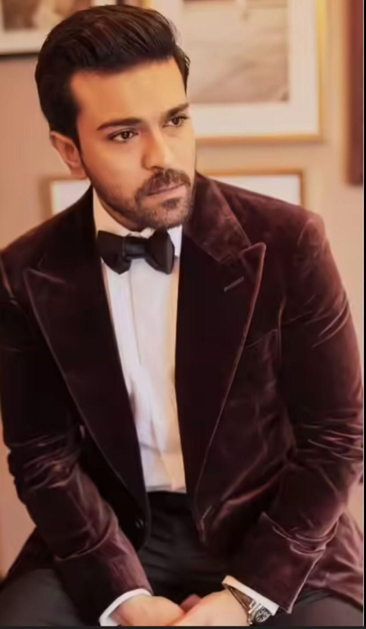 Ram Charan channels regal energy with rich textures and sharp silhouettes in this velvet blazer and bow-tie combo.